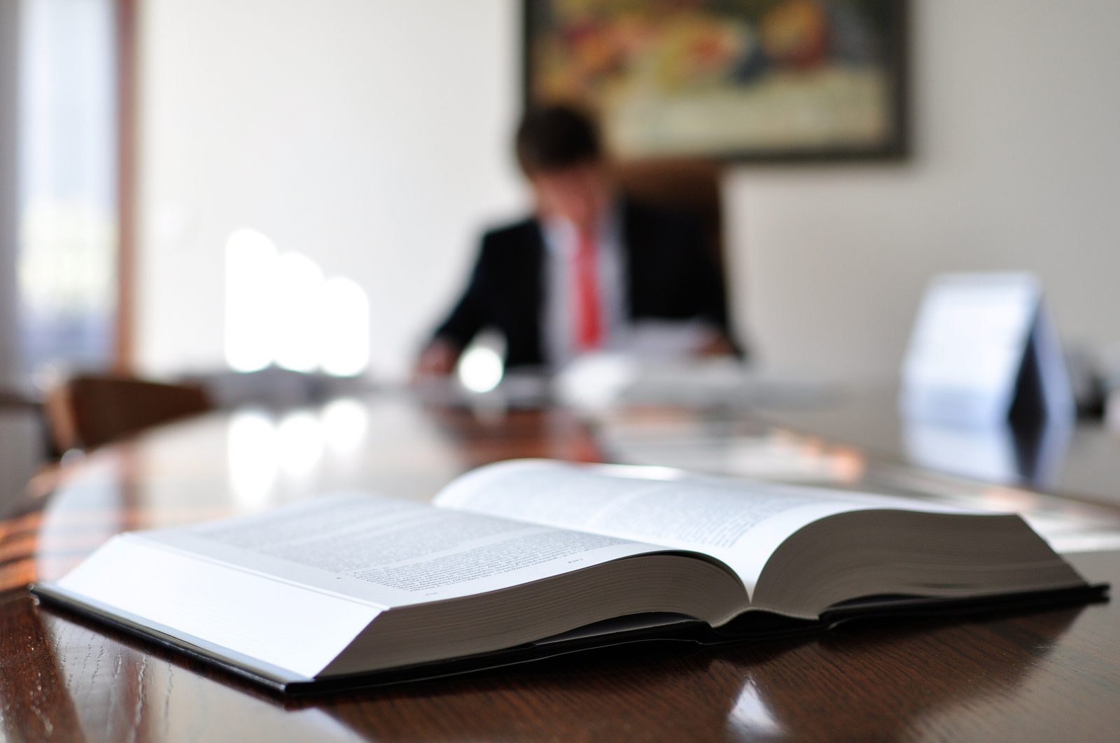 Open Texas property tax law book being reviewed ahead of an appraisal review board hearing