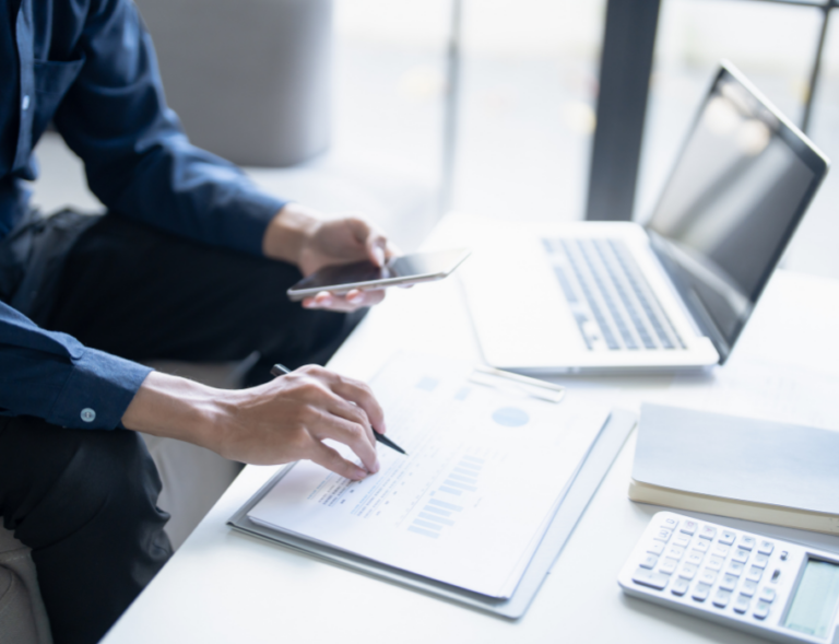 Person analyzing data with technology